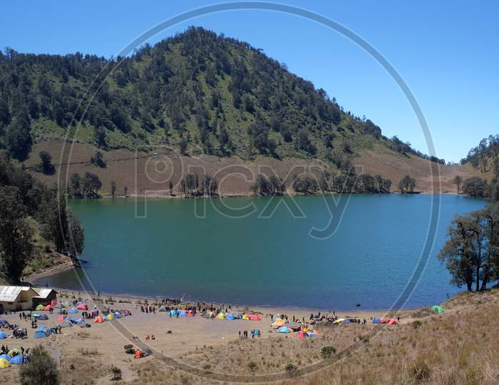 Morning atmosphere in Ranu Kumbolo, lake water is consumed by Mount Semeru climbers