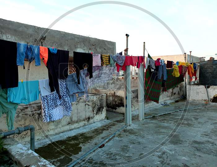 Many Clothes Put To Dry On Ropes