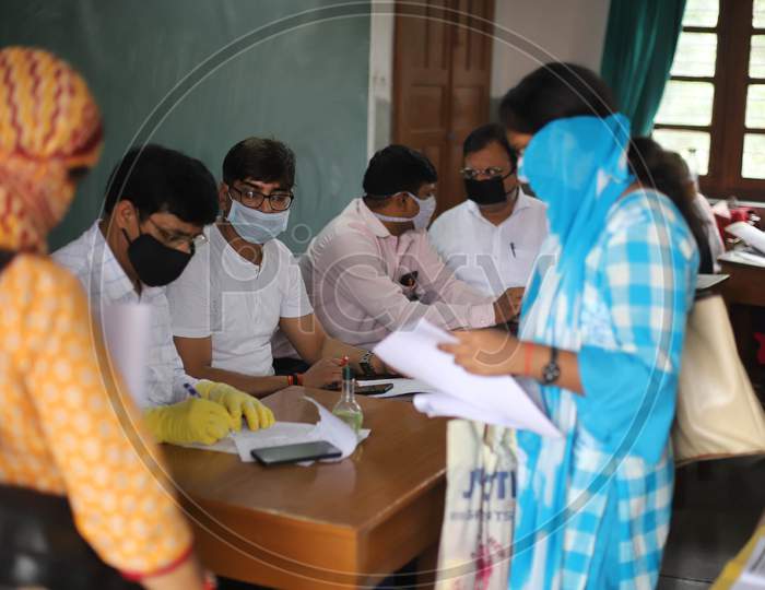Newly appointed Teachers Attend Uttar Pradesh Basic Education ( Primary)  Counselling with protective face masks at a School In Prayagraj during the extended lockdown amid coronavirus pandemic , June 3, 2020.