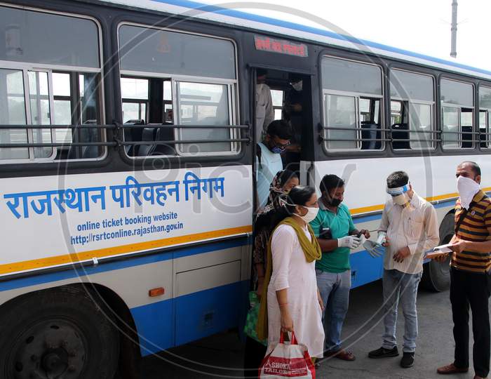Passengers Undergo Thermal Screening As They De-Board A Public Bus Following Ease Of Restrictions, During The Fifth Phase Of Covid-19 Lockdown In Ajmer, Rajasthan, India On 03 June 2020.