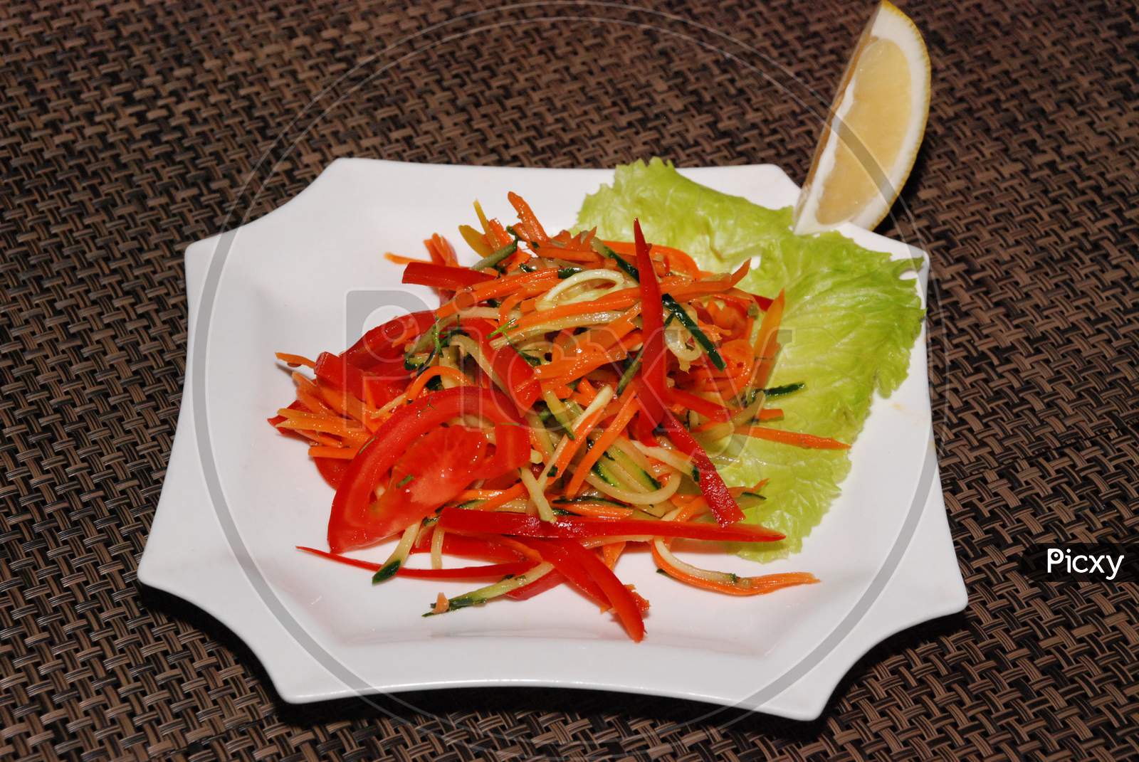 Pickled Salad With Carrot, Cucumber And Tomatoes