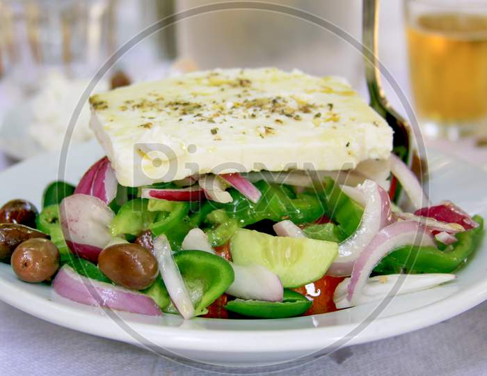 Fresh Greek Salad In The Restaurant On A Plate