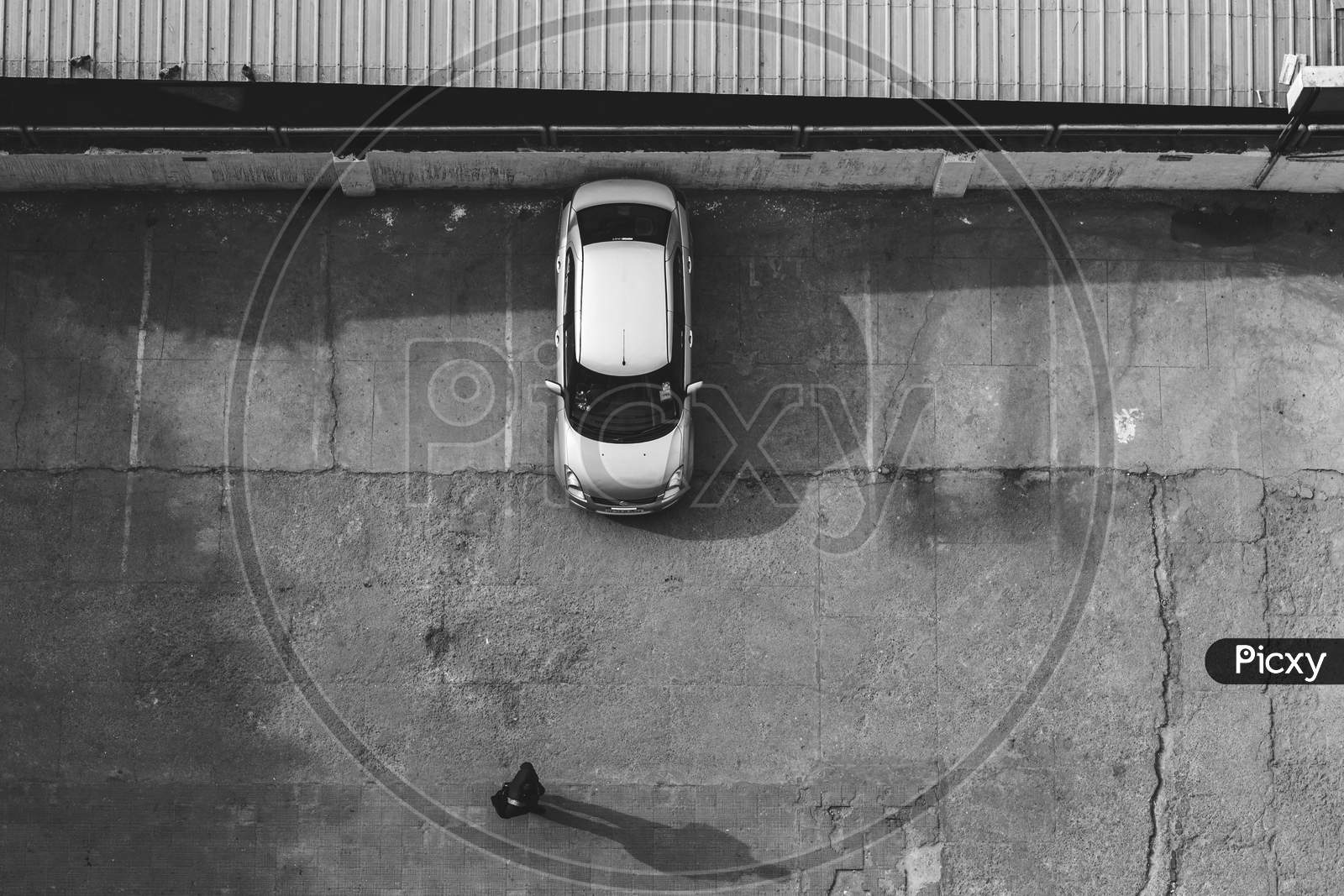 image-of-an-aerial-shot-of-a-parking-space-with-only-one-car-being