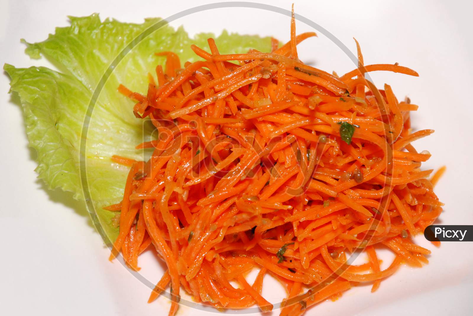 Korean Carrot Salad On The White Plate