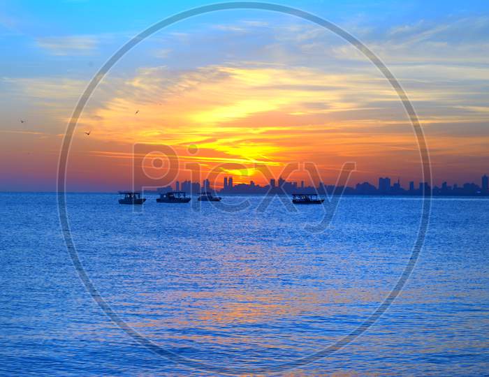 a beautiful golden sunrise near gulf sea