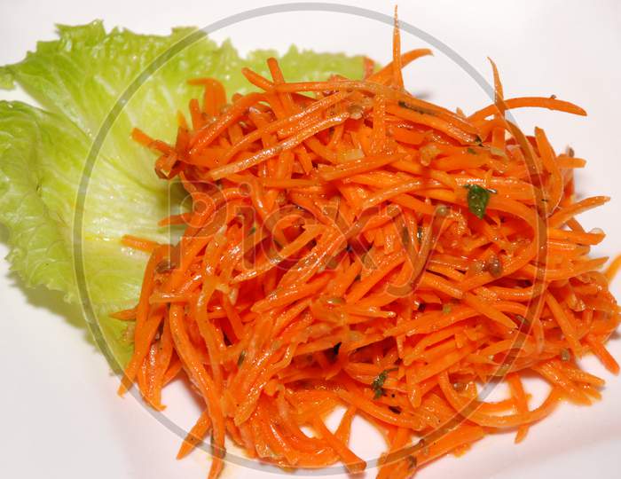 Korean Carrot Salad On The White Plate
