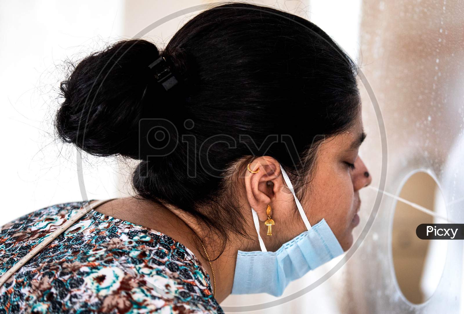 A Health Worker Collects Swab Sample From A Woman For Covid-19 Antigen Test, At Mayur Vihar On June 29, 2020 In New Delhi, India.
