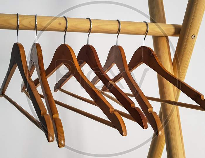 Wooden Hangers Weigh Without Clothes On A Wooden Frame.