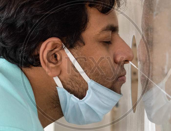 A Health Worker Collects Swab Sample From A Man For Covid-19 Antigen Test, At Mayur Vihar On June 29, 2020 In New Delhi, India.