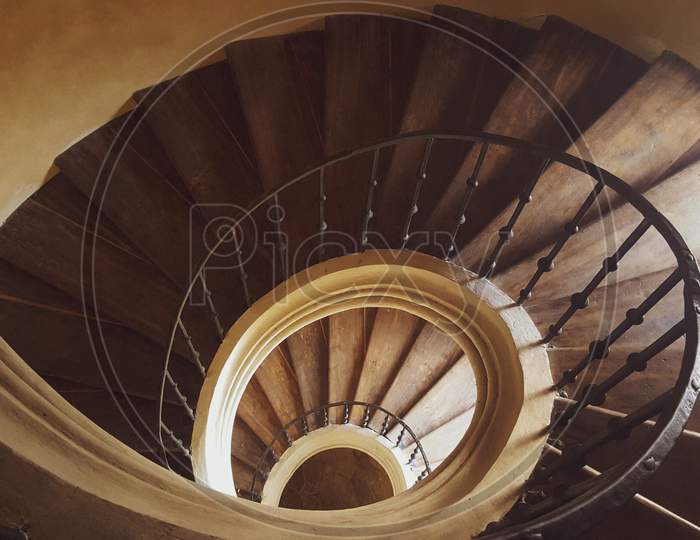 The Stairs Lead Down In A Circle.