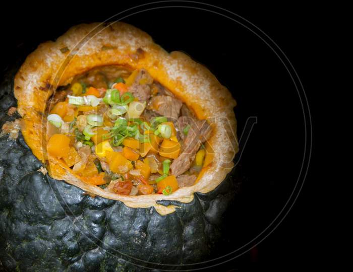 Carbonada Served In Pumpkin Typical Food Of The Argentine Gastronomy, Chile, Bolivia And Peru.