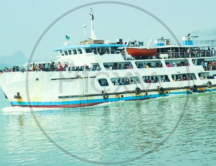 Chittagong,Bangladesh- June 30, 2020 :Running Ship Behind Seagull Are Flying With Natural Charming Scenery . Morning View On River With Natural View At Chittagong,Bangladesh..
