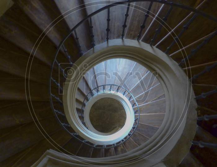 The Stairs Lead Down In A Circle.