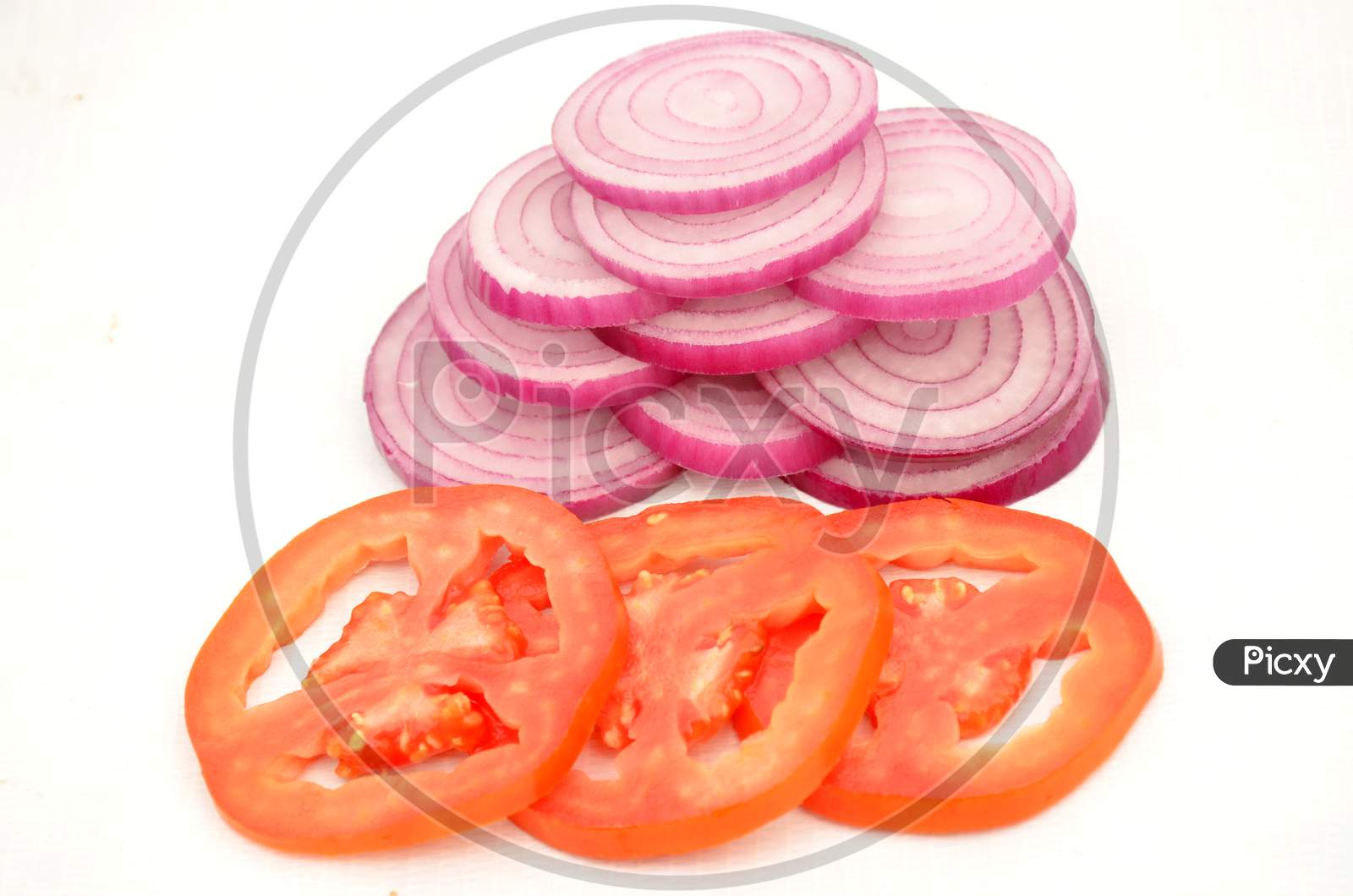 red tometo with onion slice isolated on white background