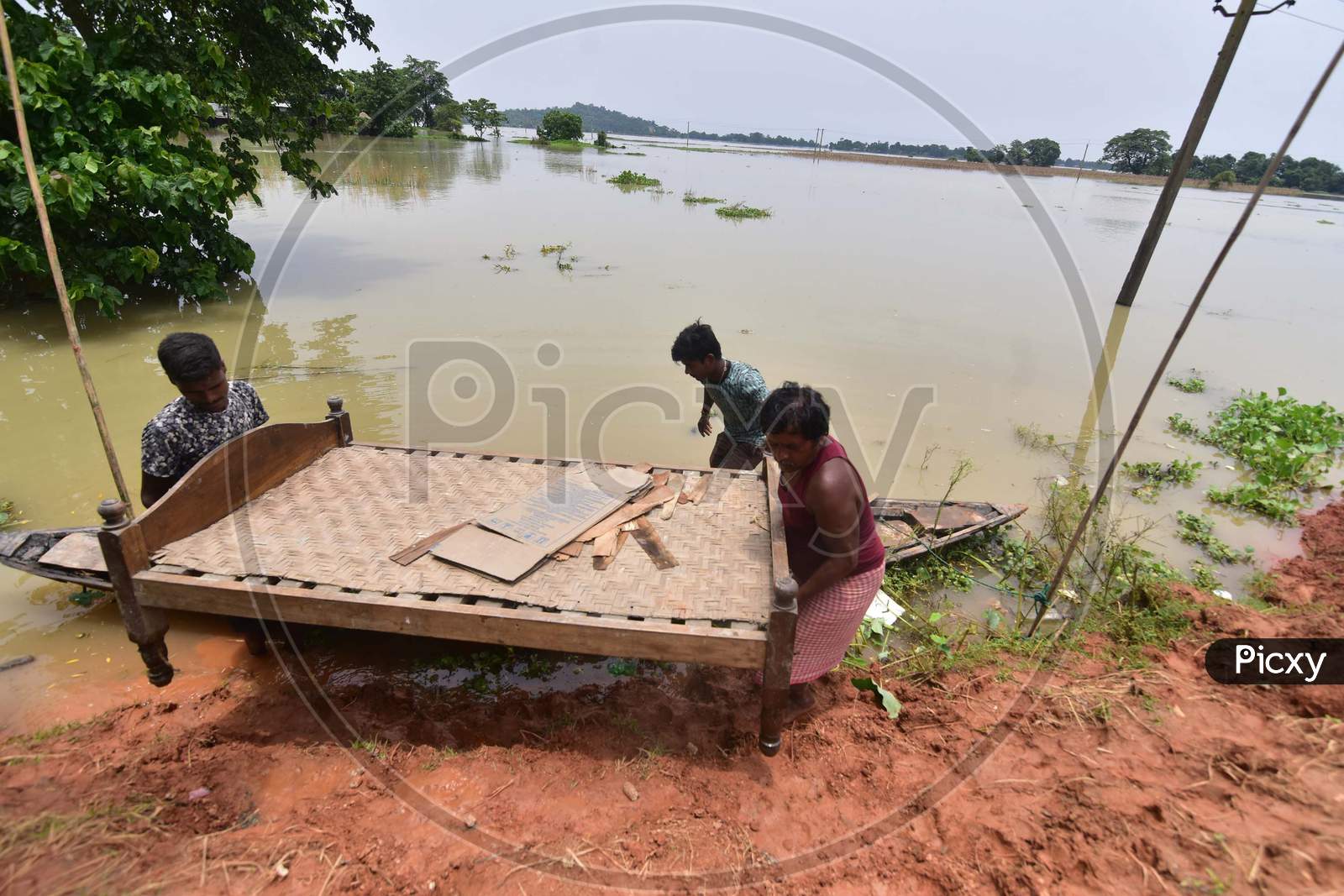 People With Their Belongings Arrive At a Safer Place At  Mayong Village In Morigaon District, In The Northeastern State Of Assam On June 29, 2020