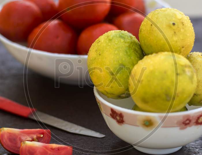 Yellow Organic Lemons In A Bowl