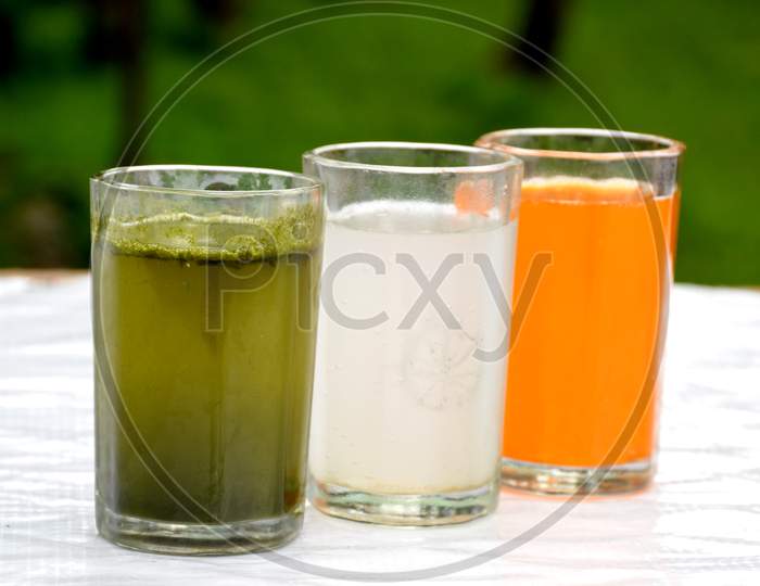 the indian flag from orenge, lychee, and green mint juice in  memorial day or veteran's day.