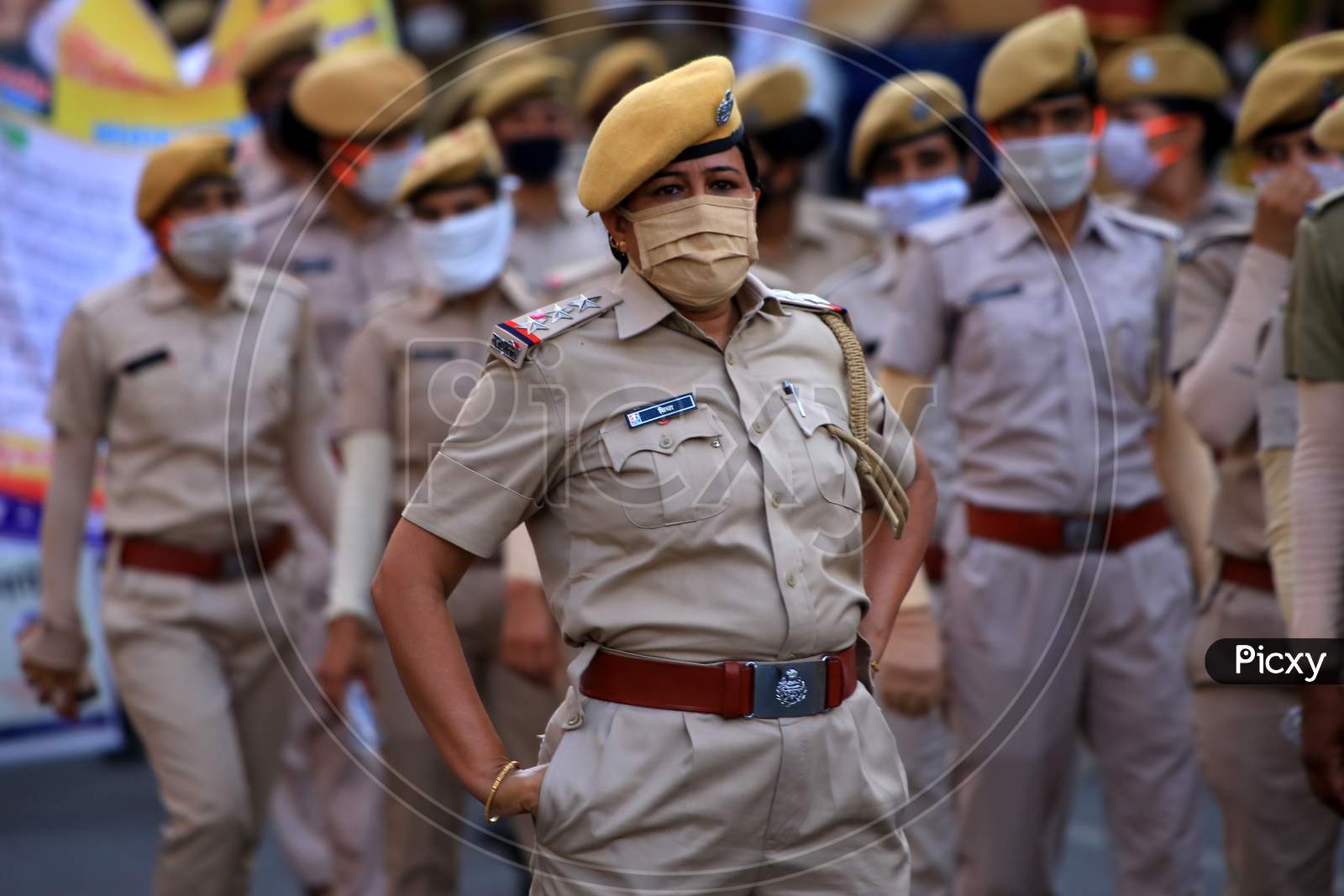 Women police officers participate in the flag march to spread awareness on Covid-19 in Ajmer, Rajasthan on July 02, 2020.