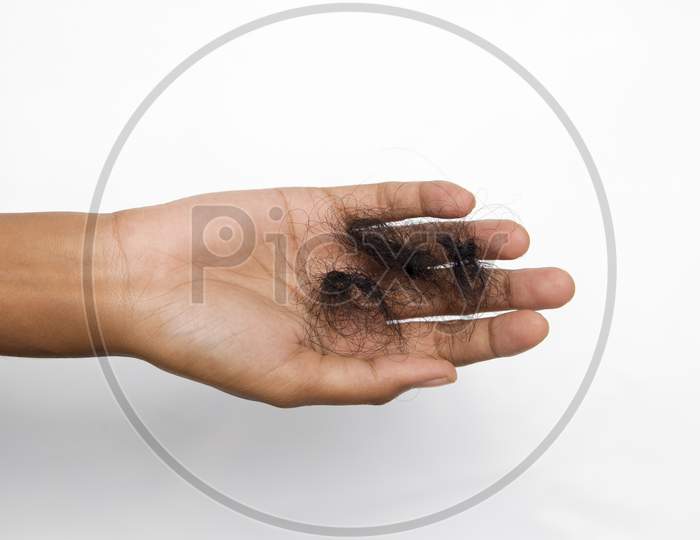 hair fall with a lady hand