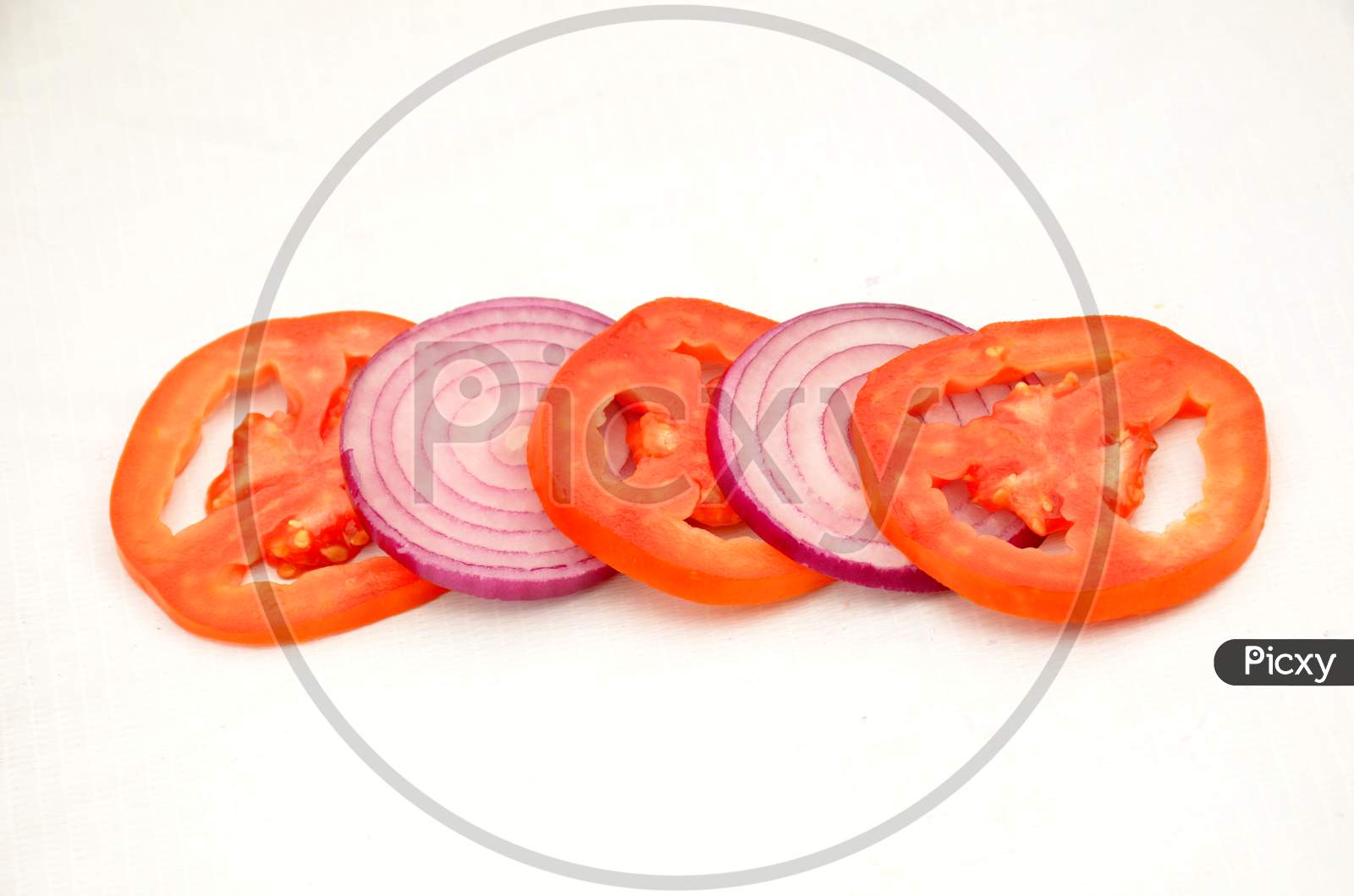 tometo and onion slice isolated on white background.