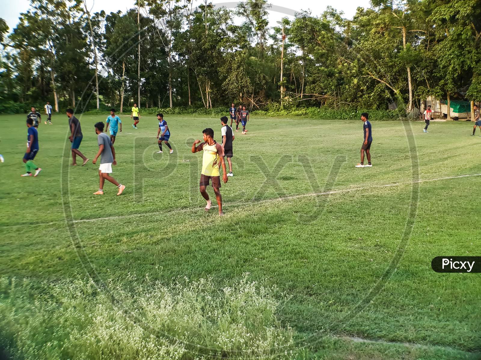 The Boys Are Playing Foot Balls On The Playground. Sports Is A Medium Of Physical Exercise, Foot Ball Is One Of Them.