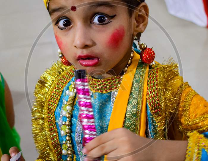 Delhi, India - September 9, 2019 : Cute Indian Kids dressed up as little Lord Krishna Radha on the occasion of Krishna Janmastami Festival in Delhi India