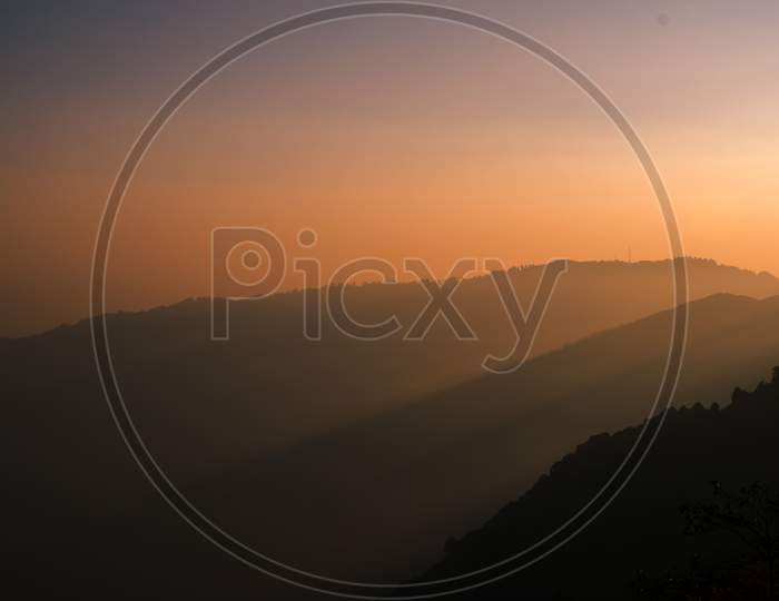 A beautiful sunset landscape of mountain range of Eastern himalaya in Okhrey east Sikkim India