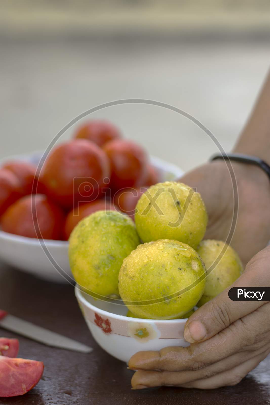 Yellow Organic Lemons In A Bowl