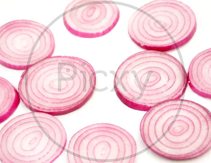 sliced onion isolated on white background.