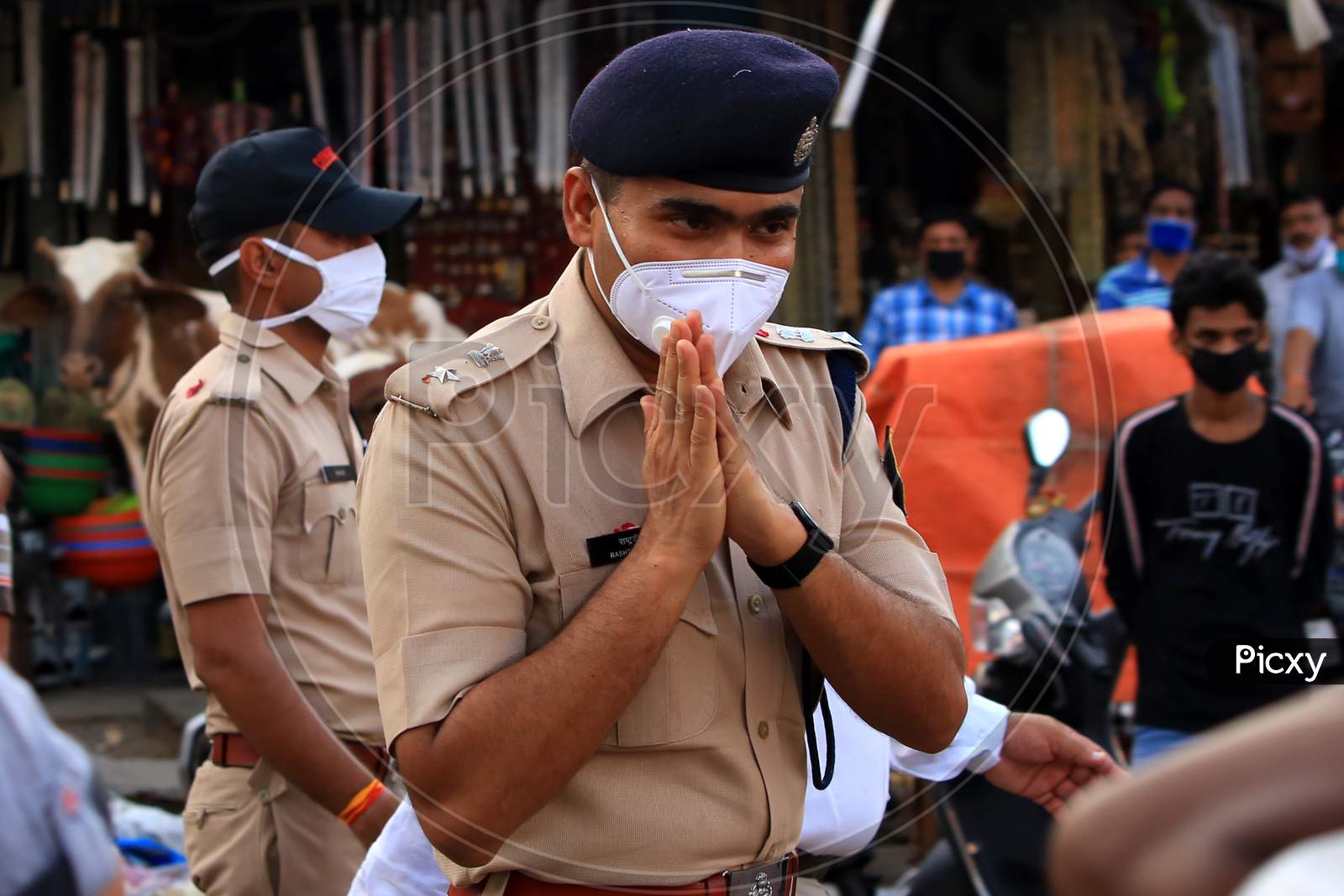 A police officer participates in a flag march organised to spread awareness on Covid-19 in Ajmer , Rajasthan on July 02, 2020.