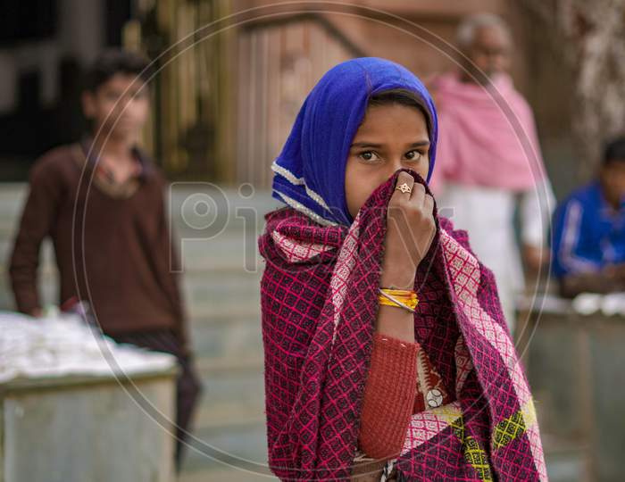 Pushkar, Rajasthan / India- June 5 2020 : A Girl In A Saree Holding A Part Of It In Front Of Her Face, Hiding Her Face.