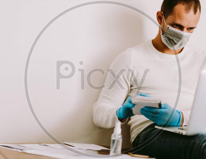 Man Working At Home On Quarantine Self Isolation