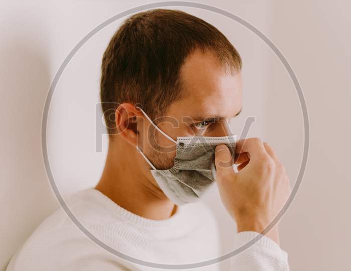 Man Wearing Face Mask For Virus Prevention On Quarantine