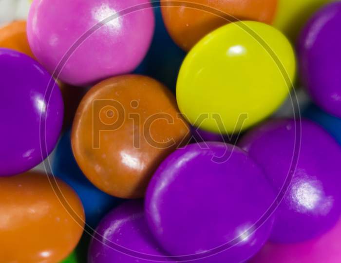 Gems chocolate candy with white background