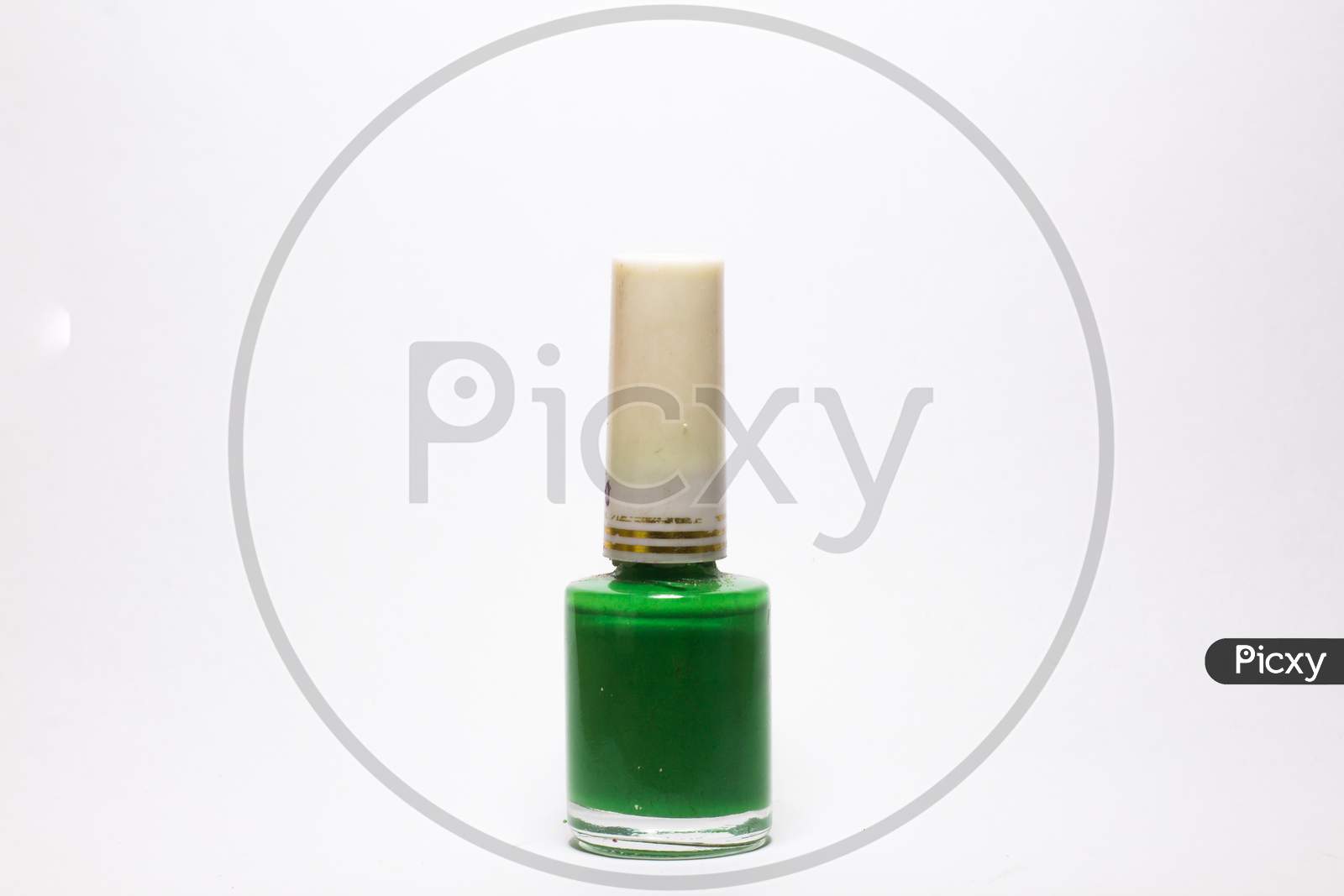 Green Nail Polish Bottle On White Background
