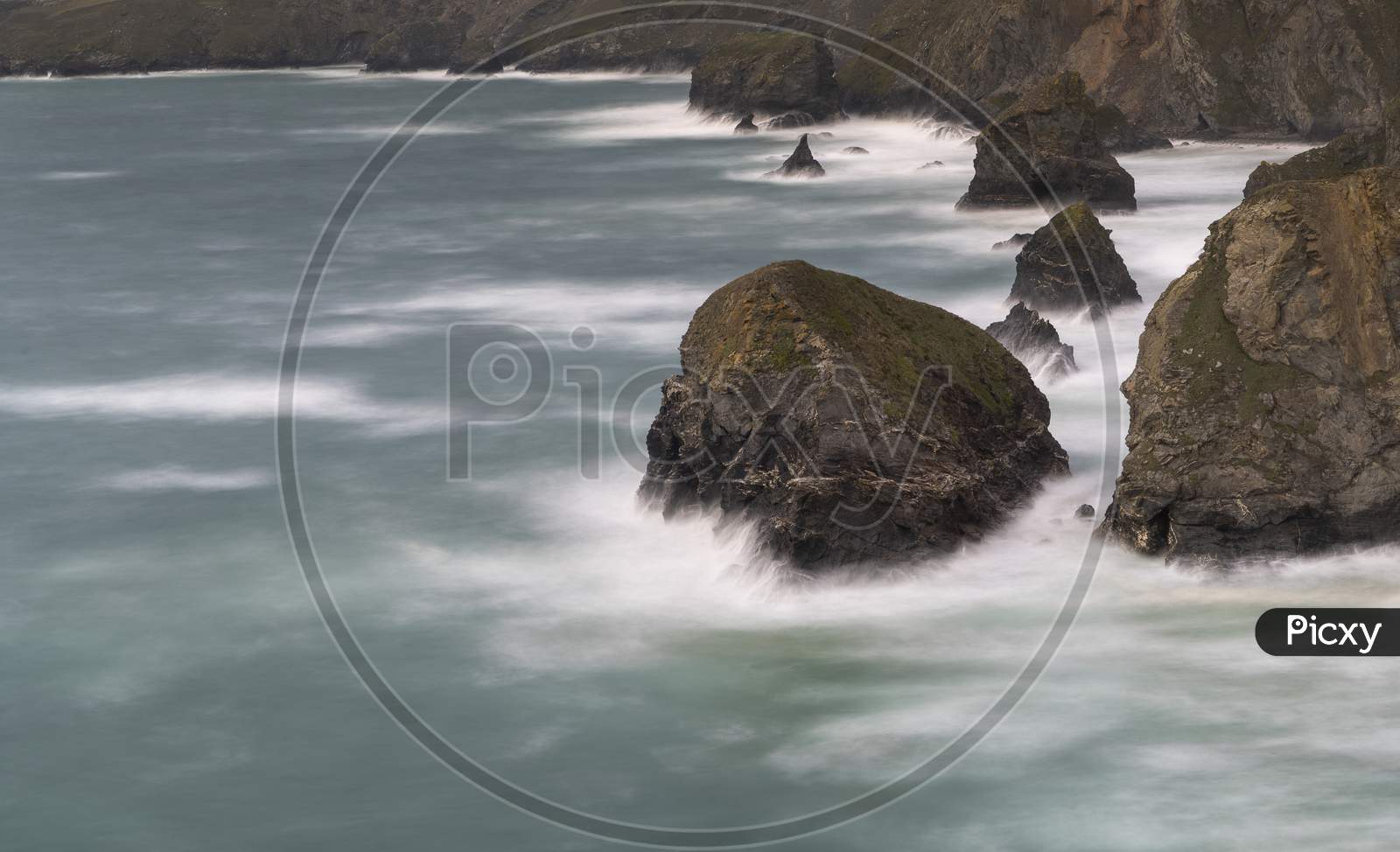Waves Crash Onto The Rocks At Carnewas And Bedruthan Steps, Newquay, Cornwall,Uk