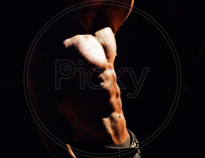 Silhouette Of Sexy Muscular Man Shirtless Wearing Jeans