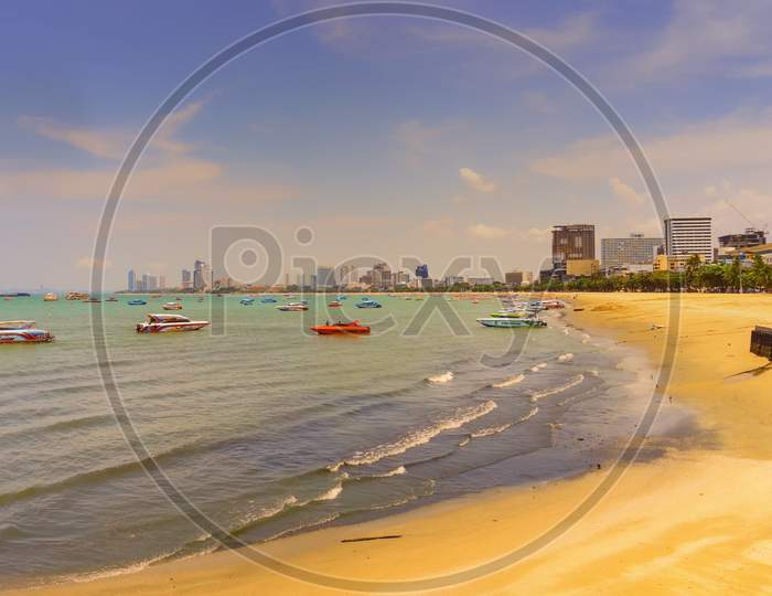 Pattaya,Thailand - April 10,2019:The Beach This Is The Beach Of The City.There Are A Lot Of Small Boats Which Transports Tourists To The Islands Koh Larn And Koh Sak.