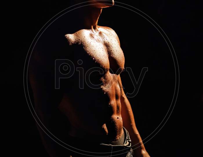 Handsome Wet Muscular Man Shirtless Wearing Jeans Silhouette