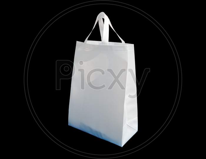 Biodegradable Eco Friendly Cloth Bags or Luggage Carry Bags Over an Isolated Black Background