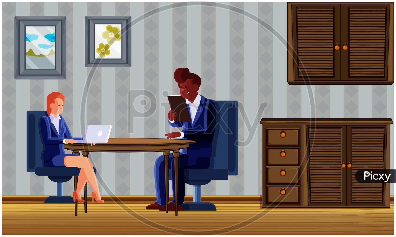 Couple Sitting In Living Room And Using Electronic Devices