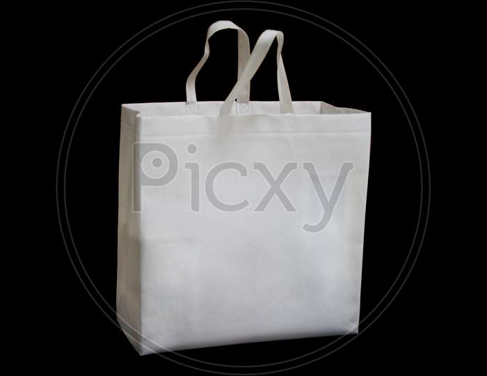Biodegradable Eco Friendly Cloth Bags or Luggage Carry Bags Over an Isolated Black Background