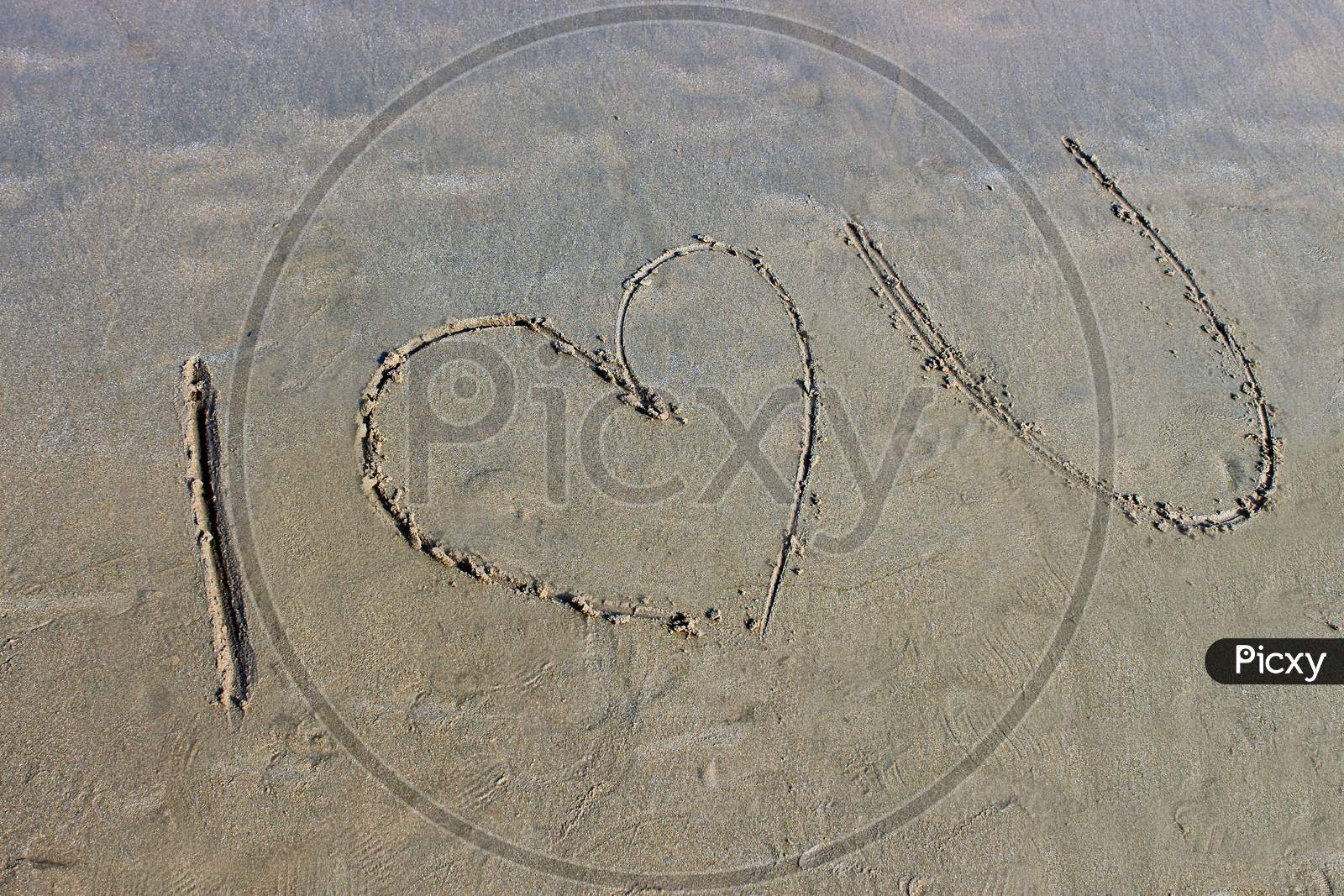 I Love You written on a Beach Shore