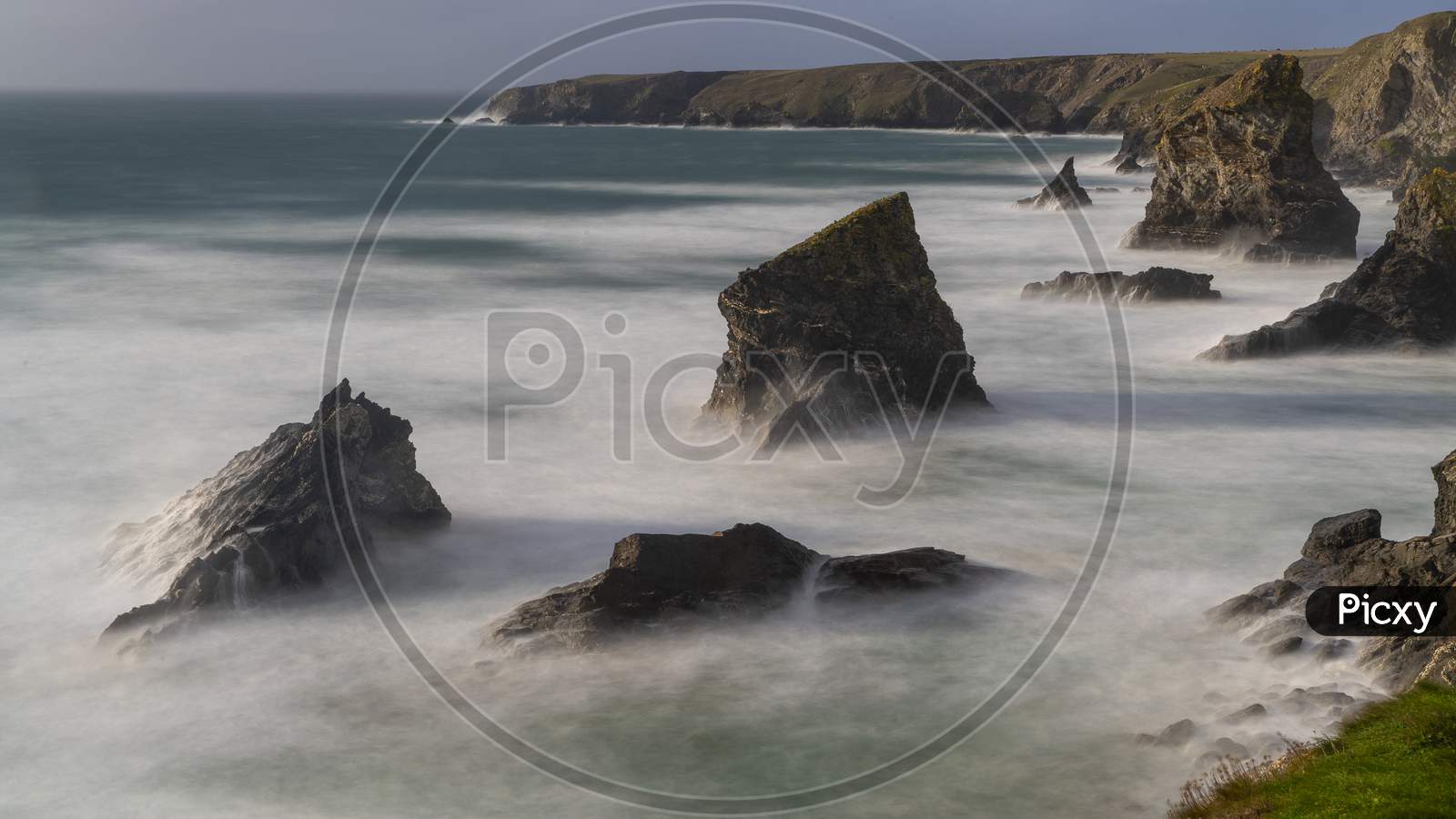 Waves Crash Onto The Rocks At Carnewas And Bedruthan Steps, Newquay, Cornwall,Uk