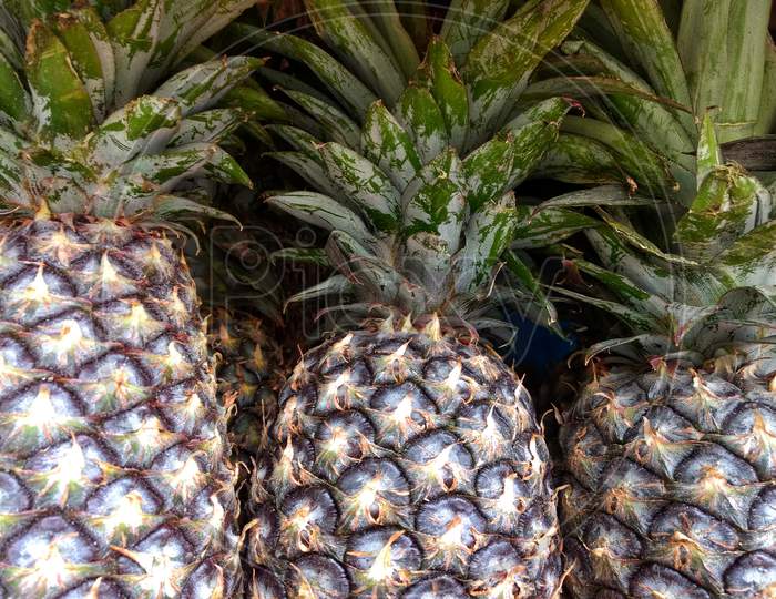 Closeup Of Pineapple fruit Forming a Background