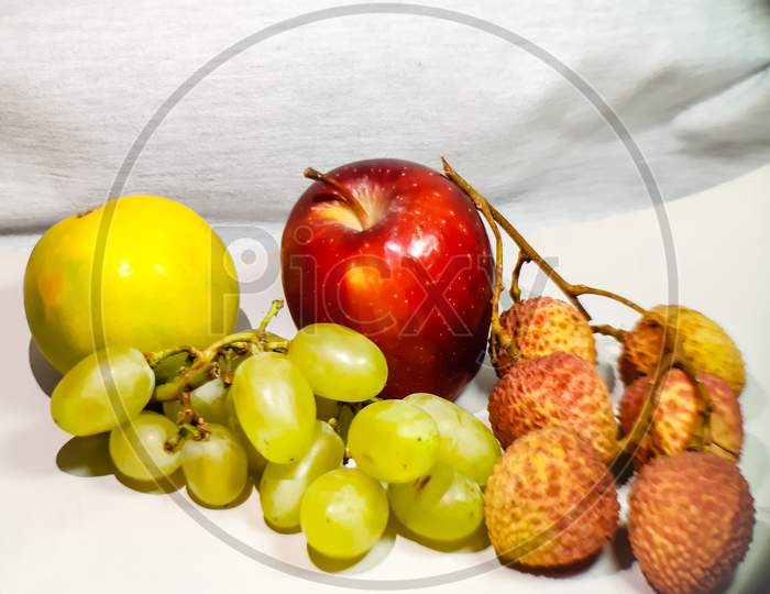 Many Types Of Fruits Are Kept On A White Background And These Are Very Beneficial For Health.