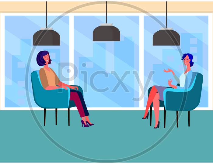 Two Females Are Sitting In Office For Business Meeting