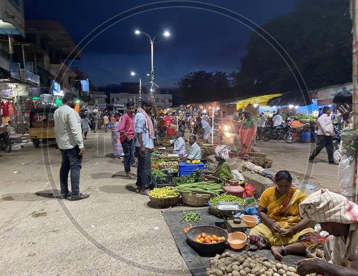 Vegetable vendors in a rural town.