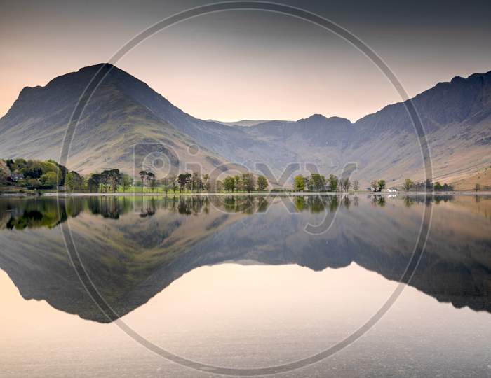 Reflections On Buttermere Lake At Dawn