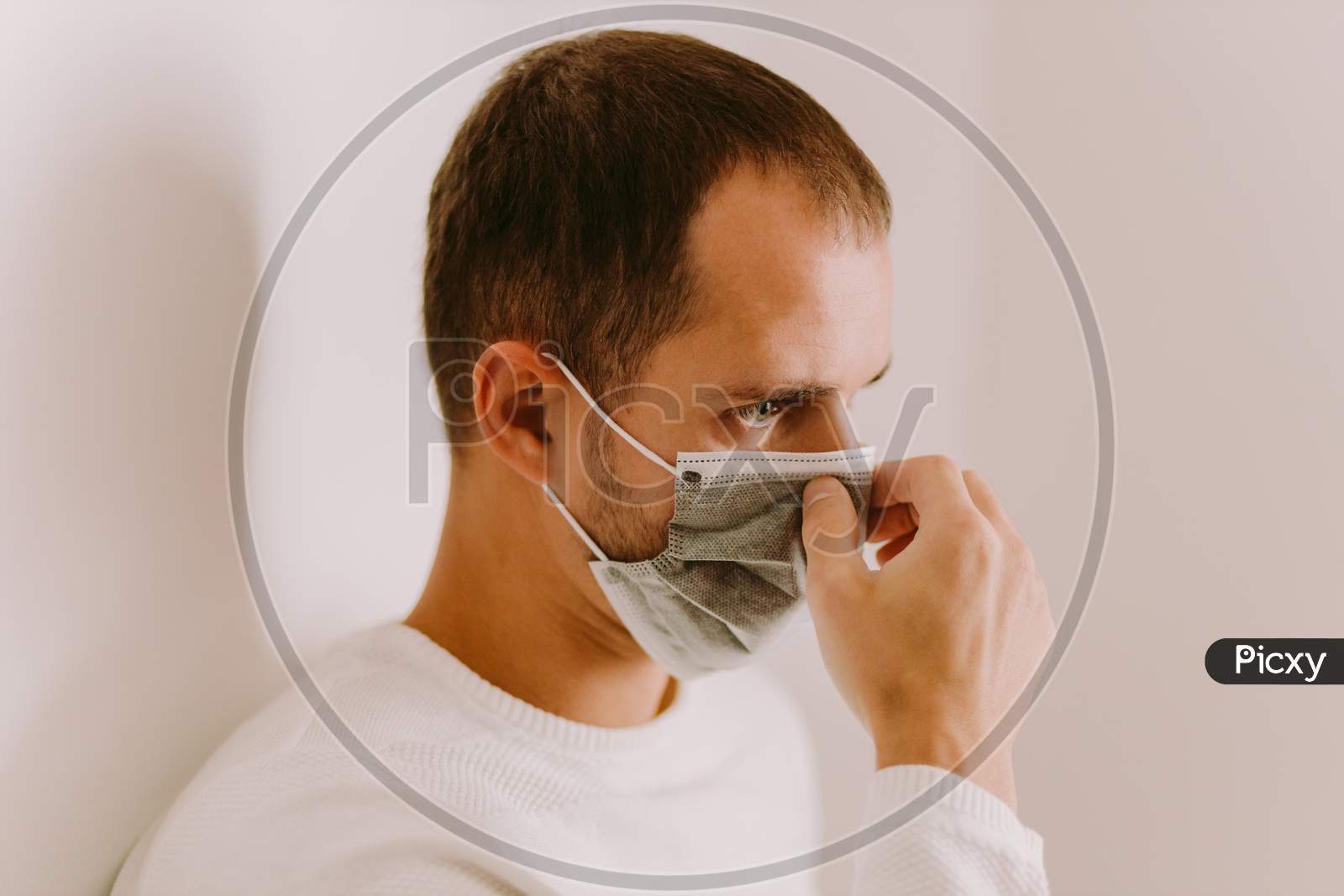 Man Wearing Face Mask For Virus Prevention On Quarantine